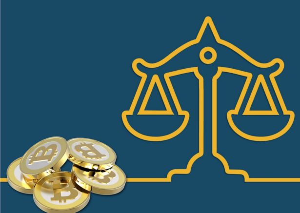 bitcoins next to cartoon image of law balance