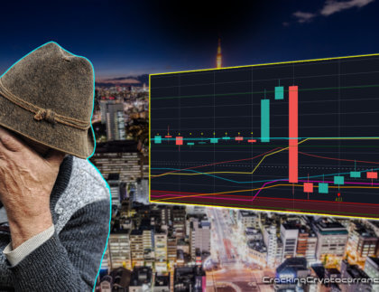 japanese man hand on forehead upset with chart picture next to him with bad red candle
